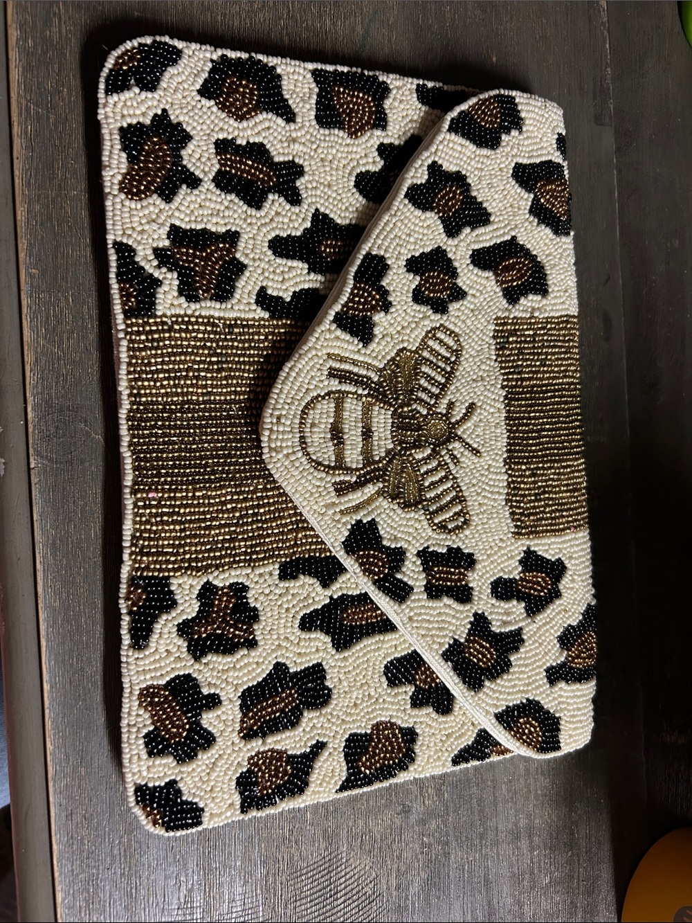 White Leopard Queen Bee Beaded Envelope Clutch features a distinct golden bee - Picture 1 of 5